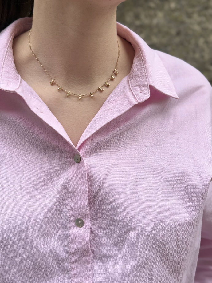 Collier perles suspendues